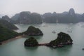 Halong Bay in mystical clouds. Mystical atmoshpere in the world famous halong bay.