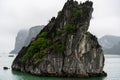 Halong Bay in mystical clouds. Mystical atmoshpere in the world famous halong bay.