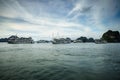 Halong bay with tourist junks and rocky islands. Popular landmark, famous destination of Vietnam Royalty Free Stock Photo