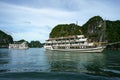 Halong bay with tourist junks and rocky islands. Popular landmark, famous destination of Vietnam Royalty Free Stock Photo