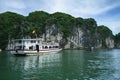 Halong bay with tourist junks and rocky islands. Popular landmark, famous destination of Vietnam Royalty Free Stock Photo