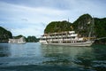 Halong bay with tourist junks and rocky islands. Popular landmark, famous destination of Vietnam Royalty Free Stock Photo