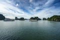 Halong bay with tourist junks and rocky islands. Popular landmark, famous destination of Vietnam Royalty Free Stock Photo