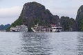 Halong bay UNESCO world natural heritage, Vietnam. Tourist cruise ships sailing among limestone mountains in Halong Bay, Vietnam Royalty Free Stock Photo