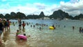 HALONG BAY, VIETNAM - JUNE 27, 2017: swimmers enjoying the beach and water at ti top island in halong bay