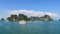 Halong bay in Vietnam, South Asia, and Tourist Junks. Panoramic view. Travel destination and natural background Royalty Free Stock Photo