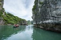 Halong bay in Vietnam, UNESCO World Heritage Site, with tourist rowing boats