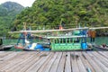 Halong Bay, Vietnam. Unesco World Heritage Site. Traditional tourist boats.