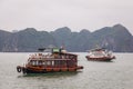 Halong Bay, Vietnam. Unesco World Heritage Site. Traditional tourist boats.