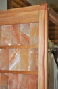 Halotherapy room construction. A close-up of a salt room, salt chamber wall built from pink Himalayan salt bricks Royalty Free Stock Photo