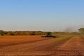 John Deere combine harvesting soybeans Royalty Free Stock Photo