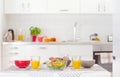 Halthy breakfast on table in white kitchen