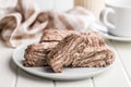 Halva with cocoa. Sweet oriental dessert on plate Royalty Free Stock Photo