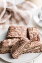 Halva with cocoa. Sweet oriental dessert on plate Royalty Free Stock Photo