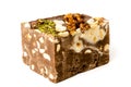 Halva with cocoa and walnuts, almonds and cashews.