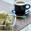 Halva pistachio and cup of coffee