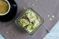 Halva pistachio and cup of coffee Royalty Free Stock Photo