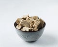 Halva slices in a bowl. Oriental sweetness. Copy space.