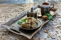 Halva on a tray and a cup of black coffee. Royalty Free Stock Photo