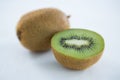 Halved kiwi on white background Royalty Free Stock Photo