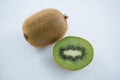 Halved kiwi on white background Royalty Free Stock Photo
