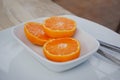 Halved Oranges in White Bowl Royalty Free Stock Photo