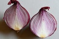 Halved Red Onion on a white background Royalty Free Stock Photo
