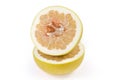 Halved ripe pomelo fruit on a white background Royalty Free Stock Photo