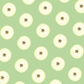 Halves of fresh apple on light green background, seamless pattern Royalty Free Stock Photo
