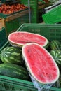 Halves of a large juicy ripe watermelon in the store