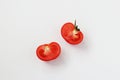 Halves of a tomato isolated on a white backgroundi Royalty Free Stock Photo