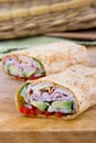 Ham and avocado sandwich wrap roll Royalty Free Stock Photo