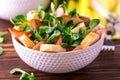 Ham bacon, cucumber, spinach and crackers salad