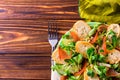 Ham bacon, cucumber, spinach and crackers salad