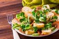 Ham bacon, cucumber, spinach and crackers salad