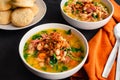 Ham Bone Soup with White Beans and Kale Served with Buttermilk Biscuits Royalty Free Stock Photo