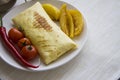 Ham burrito with hot spicy vegetables Royalty Free Stock Photo