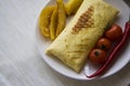 Ham burrito with hot spicy vegetables Royalty Free Stock Photo