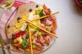 Ham, cheese, baked potatoes, olives and olives with wine. Snack dinner table concept top view Royalty Free Stock Photo