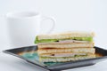 Ham, cheese and salad sandwich on a plate Royalty Free Stock Photo