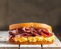 Ham and cheese sandwich on wooden surface