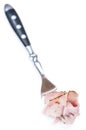 Ham on a fork (isolated on white) Royalty Free Stock Photo