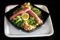 Ham and green salad with egg Royalty Free Stock Photo