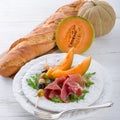 Ham with melon and olives Royalty Free Stock Photo