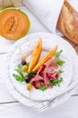 Ham with melon and olives Royalty Free Stock Photo