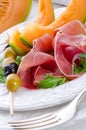 Ham with melon and olives Royalty Free Stock Photo