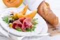 Ham with melon and olives Royalty Free Stock Photo
