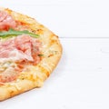 Ham pizza prosciutto copyspace copy space square on wooden board