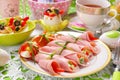 ham rolls stuffed with cheese and vegetables for easter breakfast Royalty Free Stock Photo