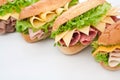 Ham, salami, turkey and beef sandwiches Royalty Free Stock Photo